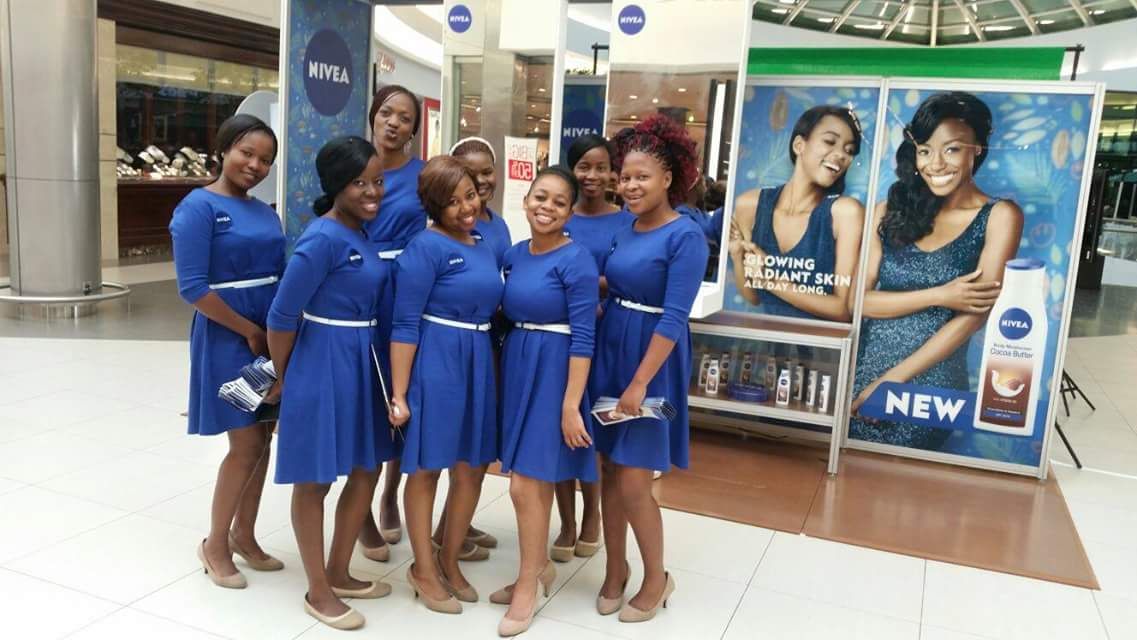 Team of brand ambassadors in blue uniforms at a NIVEA mall activation